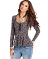 Floral lace and a peplum hem makes this Free People top an oh-so flirty pick for pairing with denim!