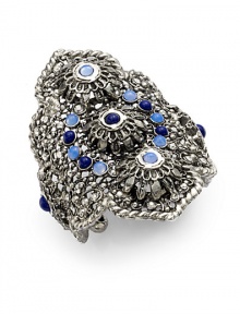 THE LOOKGypsy CollectionCuff silhouetteScalloped edgesLapis cabochon, blue opal and Swarovski crystal accentsAntique silverplated settingTHE MEASUREMENTWidth, about 4Diameter, about 2¾Opening, about 1ORIGINMade in USA