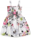 Light summer style. She can dress for the season in this dainty floral dress from Jayne Copeland.