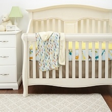 Brightly colored giraffes in blue, brown, orange and yellow parade among tree branches and puffy clouds. The Complete Sheet Set includes the complete sheet, crib skirt, nursery blanket and decorative wall decals.The American Academy of Pediatrics and the U.S. Consumer Product Safety Commission have made recommendations for safe bedding practices for babies. When putting infants under 12 months to sleep, remove pillows, quilts, comforters, and other soft items from the crib.