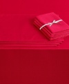 All together now. This clever and incredibly versatile Westin table in a bag set includes a tablecloth, napkins and placemats for up to eight guests. A holiday-red hue and subtle texture add to its timeless appeal. (Clearance)