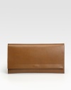 A sleek envelope bag crafted from rich, butter-smooth leather.Flap snap closure9½W X 6H X 1½DMade in Italy