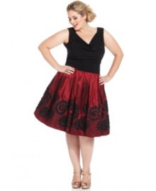 SL Fashions crafts a plus size party dress featuring a flattering ruched waistline and a full, applique-embellished skirt.