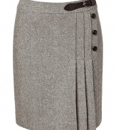 Stylish skirt in fine wool-viscose blend in elegant salt and pepper - Slim cut with decorative asymmetrical pleating, decorative buttons and leather clasp at waist - Professional mid-thigh length - Favorite basic for the office with matching blazer and silk blouse or with thin sweater and heels