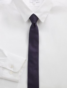 A simplistic design woven in smooth Italian silk.About 2 wideSilkDry cleanMade in Italy