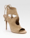 Metal-tip ties back this suede design, with skin-baring cutouts and a daring heel. Self-covered heel, 4½ (115mm)Suede upper with suede metal-tip tiesLeather lining and solePadded insoleMade in Italy