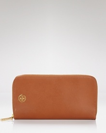 With space for all the everyday essentials, Tory Burch's brown leather zip-around wallet is indispensably chic.