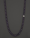 Faceted amethyst is punctuated by a sparkling topaz bead in this striking necklace from Anzie.