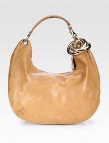 Supple calfskin leather in a slouchy hobo silhouette, finished with polished hardware for a signature look.Top handle, 7½ drop Top top closure One inside zip pocket One inside open pocket Suede lining 17W X 12H X 5½D Made in Italy