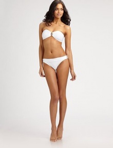 A classic style with a folded sash waistline and gold detailing for a superior design. Full cut bottomBanded waistlineFully lined80% polyamide/20% spandexHand washImported Please note: Bikini top sold separately.