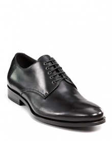 Simply civilized. This leather shoe has lace-up with eyelets and subtle stitching for an all-around clean look.