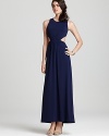 A skin-revealing back cutout lends a modern edge to this Susana Monaco maxi dress, cut in a sleek, minimalist silhouette.