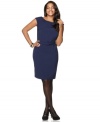 Look polished in pleats with Spense's sleeveless plus size sheath dress, accentuated by a belted waist.