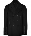 Sophisticated with a downtown edge, this wool-cashmere pea coat from British heritage brand Belstaff gets toughened up with a zipper-laden motorcycle styling - Spread collar, double-breasted with button front placket, long sleeves with exposed zip cuffs, exposed zip pockets, moto-styled seaming at arms, belted back waist with adjustable buttons - Slim fit - Style with jeans or slim trousers, a long sleeve henley, and motorcycle boots