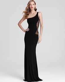 ABS by Allen Schwartz' long and lean gown lends timeless sophistication with a one-shouldered silhouette. Beaded and mesh details lend a fashion-forward finish.