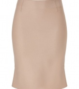 Luxurious skirt in fine nude-colored pure wool - Wonderfully soft and flattering - The cut is slim and slightly flared at the bottom (peplum look), in a comfortable mid thigh length - A favorite basic in a fantastic fashion color - Elegant, professional and fashionable - Wear with an elegant silk blouse, top, blazer or cardigan