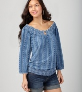 The classic Mena shirt from Lucky Brand Jeans gets revamped with a cool Moroccan-inspired print. The smocked scoop neckline lets you show a little shoulder when the weather warms up!