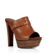 Channel sophisticated 1970s-inspired style with these luxe high heel clogs from Sergio Rossi - Open toe, belt-detailed front, stacked wooden front platform and chunky heel - Wear with high-waisted flared jeans, a billowy blouse, and a fringe-detailed bag