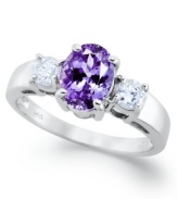 A true beauty. This stunning ring features an oval-cut tanzanite center stone (1-3/8 ct. t.w.) accented by round-cut diamonds on the sides (3/8 ct. t.w.). Set in 14k white gold.