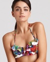 Nanette Lepore's butterfly-kissed bikini top is a must for the cabana coquette. This ruffled bandeau partners with the matching bottom for a splash of sultry.