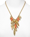 This season, the bolder your jewelry the better. Make statement style yours with this gold-tone bib necklace from T Tahari, accented by cascading resin beads.