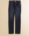 Jeans and leggings in one, in a medium wash with subtle front whiskering and classic 5-pocket jean details.Waistband with belt loops and button close Front zip fly Front pockets, including coin pocket, with rivet details Back patch pockets Whiskering across thighs Skinny fit Cotton/polyester/spandex; machine wash Made in USA