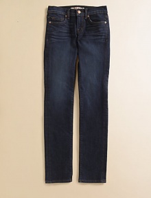 Jeans and leggings in one, in a medium wash with subtle front whiskering and classic 5-pocket jean details.Waistband with belt loops and button close Front zip fly Front pockets, including coin pocket, with rivet details Back patch pockets Whiskering across thighs Skinny fit Cotton/polyester/spandex; machine wash Made in USA