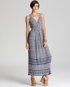 Evoke bohemian elegance in this Joie maxi dress, printed with petite florals and finished with a finely pleated skirt.