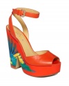 The tropical colors of Brasil inspired the Troi Chic platform shoes by Nine West. With a chunky wedge heel, this brightly-hued shoe will stand out no matter what you pair it with.