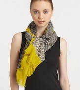 An animal print style with a solid border in lightweight wool. WoolAbout 68 X 40Dry cleanImported 