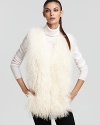 Make a lavish style statement in this Rachel Roy vest, rendered in plush cream fur. Wear it with sleek ponte pants for an undeniably stunning contrast.