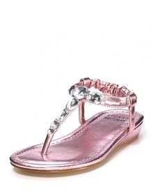 Add sparkle to a sunny day with these pretty metallic pink Stuart Weitzman sandals, adorned with various size rhinestones.