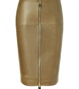 Tough goes luxe with this supple zipper-detailed leather pencil skirt from Hakaan - Classic pencil silhouette, slash pocket, front two-way exposed zip closure, seaming details, supple smooth leather- Wear with a cashmere pullover or silk blouse and platform pumps