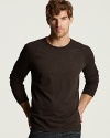 Long sleeve crewneck with knit ribbed shoulders and side detailing. Lightweight.