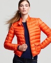 Brighten chilly days with this vibrant down lightweight puffer jacket from Moncler.