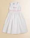 A classic look for adorable girls everywhere, shaped from soft cotton piqué with a grosgrain ribbon waist and pretty pink trim. Back button closure Gathered empire waist Cotton Machine wash Made in USA FOR PERSONALIZATION Select a quantity, then scroll down and click on PERSONALIZE & ADD TO BAG to choose and preview your personalization options. Please allow 2 weeks for delivery.