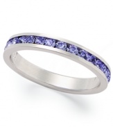 Traditions beautiful stacking ring is perfect when paired with other slim rings, but makes a pretty sparkling statement all its own. Crafted in sterling silver, a thin band features a row of round-cut purple crystals with Swarovski elements. Size 5-10.