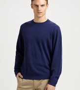 A classic crewneck pullover silhouette, rendered in warm, finespun wool.CrewneckLong sleevesRib-knit cuffs and hemAbout 28 from shoulder to hemWoolHand washImported