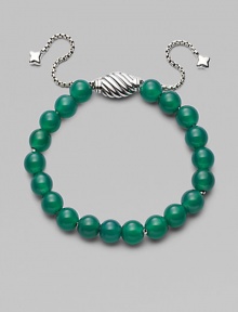 Rich green onyx is fastened by an adjustable clasp of sterling silver.Green onyx Sterling silver Bead diameter, about ¾ Imported