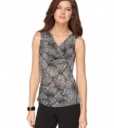 Skip the solids-layer a printed cami, like this one from Tahari by ASL, below your suit jacket for extra flair.