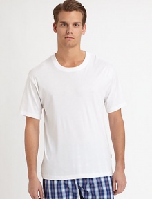 Versatile tee can stand alone or be worn as an undershirt, shaped in soft cotton, in a casual, roomy fit for all day comfort.CrewneckCottonMachine washImported