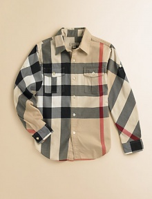 Oversized checks in a classic woven style with sporty chest pockets and sleeve tabs for roll-up options.Spread collar Long sleeves with button tabs and cuffs Front button placket Button flap chest pockets Shirttail hem Cotton; machine wash Imported Please note: Number of buttons may vary depending on size ordered. Please note: Pattern may vary. 