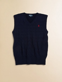 The essential sweater vest is a handsome layer rendered in durable cable-knit cotton.V-neckSleevelessPullover styleRibbed V-neck, armholes and hemCottonMachine washImported