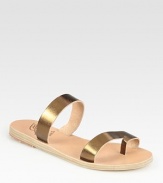 Soft leather footbed topped with glistening metallic leather straps and an unexpected toe ring. Metallic leather upperLeather lining and soleMade in GreeceOUR FIT MODEL RECOMMENDS ordering true whole size; ½ sizes should order the next whole size up. 