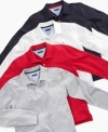 In class or on the grass, this Tommy Hilfiger polo is classic and cute.