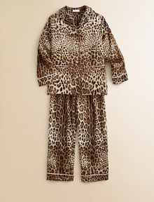 Buttery soft, silk-blend pajamas in a button-front silhouette with patch pockets, contrast piping and a bold leopard print pattern.Notched collarLong sleevesButton-frontFront patch pocketsElastic hem93% silk/7% spandexDry cleanImported Please note: Number of buttons may vary depending on size ordered. 