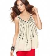 Sequins & embroidery add global-inspired style to this Andrew Charles top for a boho-rock look!