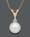 Spell out sophistication with a simple pearl. Pendant features a cultured freshwater pearl (7-7-1/2 mm) with a single diamond accent. Crafted in 14k gold. Approximate length: 18 inches. Approximate drop: 3/8 inch.