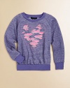 A tweedy knit of soft, plush French terry is artfully adorned with colorful cutouts that form an abstract heart.Ribbed crew necklineLong raglan sleeves with smooth knit cuffsSmooth knit banded hemFrayed, front heart cutout design80% cotton/20% polyesterHand washImported