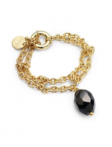 THE LOOKFaceted onyx accent Multi-chain design Logo charm 18k goldplated settingCircle claspTHE MEASUREMENTAccent drop, about 1½Length, about 8ORIGINMade in Italy